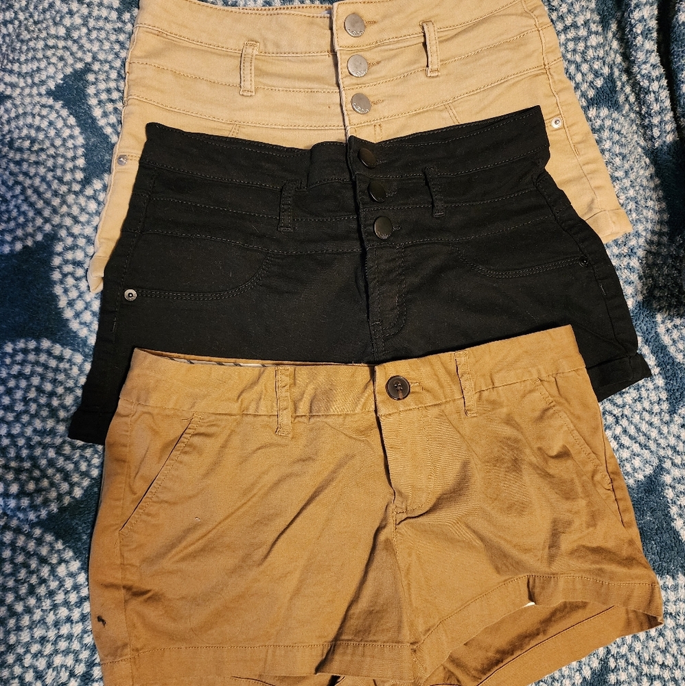 3 pairs of No Boundaries shorts. Size 9. Khaki color, darker khaki, and black.